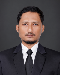 Beranda corporate headshot on dark gray background